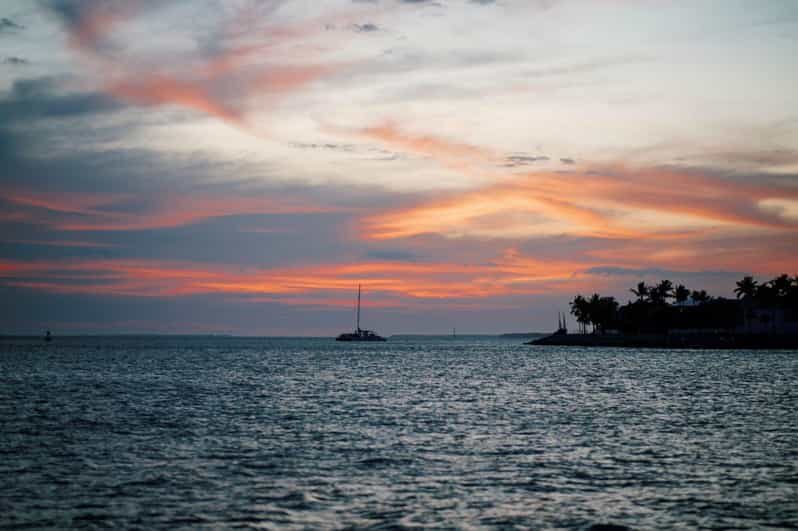 Captain's Choice: Dolphin Watch Sunset Sail - Departing the Historic Seaport: Mallory Square, Sunset Key, and Fort Zachary Taylor