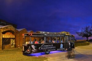 Key West: Ghosts & Gravestones Guided Trolley Tour - Entering Old Town: The 501 Front Street Trolley Start