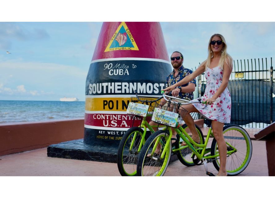 Key West: Guided Bicycle Tour with Key Lime Pie - Mallory Square: smuggling tales and the night-sunset heart of Key West